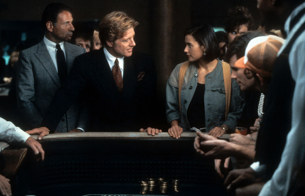 Robert Redford com Demi Moore em 